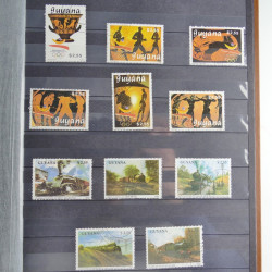 Collection timbres du monde neufs et oblitérés en 8 albums.