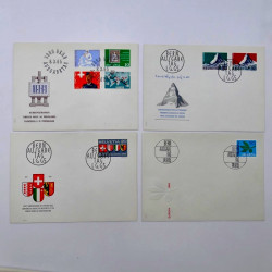 Lot de 260 enveloppes FDC timbres Suisse 1965-1984 en une boite.