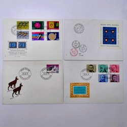 Lot de 260 enveloppes FDC timbres Suisse 1965-1984 en une boite.