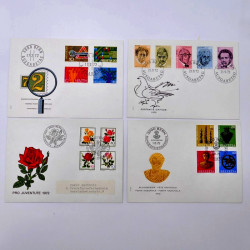 Lot de 260 enveloppes FDC timbres Suisse 1965-1984 en une boite.