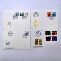 Lot de 260 enveloppes FDC timbres Suisse 1965-1984 en une boite.