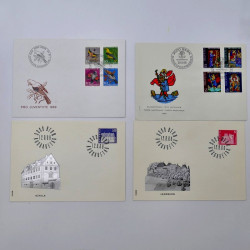 Lot de 150 enveloppes FDC timbres Suisse 1952-1984 en une boite.