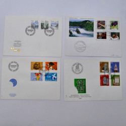 Lot de 150 enveloppes FDC timbres Suisse 1952-1984 en une boite.