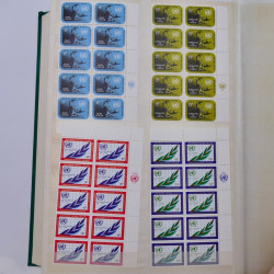 Lot de timbres Nations Unies 1951-1985 neufs en un album.