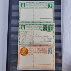 Suisse ensemble d'entiers postaux neuf et oblitérés en un album.