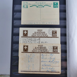 Suisse ensemble d'entiers postaux neuf et oblitérés en un album.
