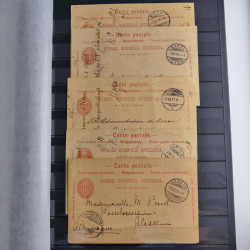 Suisse ensemble d'entiers postaux neuf et oblitérés en un album.