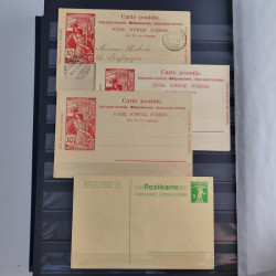 Suisse ensemble d'entiers postaux neuf et oblitérés en un album.