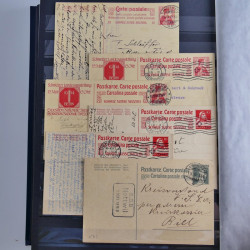 Suisse ensemble d'entiers postaux neuf et oblitérés en un album.