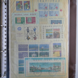 Suisse lot de timbres en feuilles, blocs neufs** et oblitérés en un album.