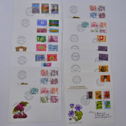 Suisse lot de +200 enveloppes premier jour FDC 1963-1983 en une boite.