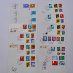 Suisse lot de +200 enveloppes premier jour FDC 1963-1983 en une boite.