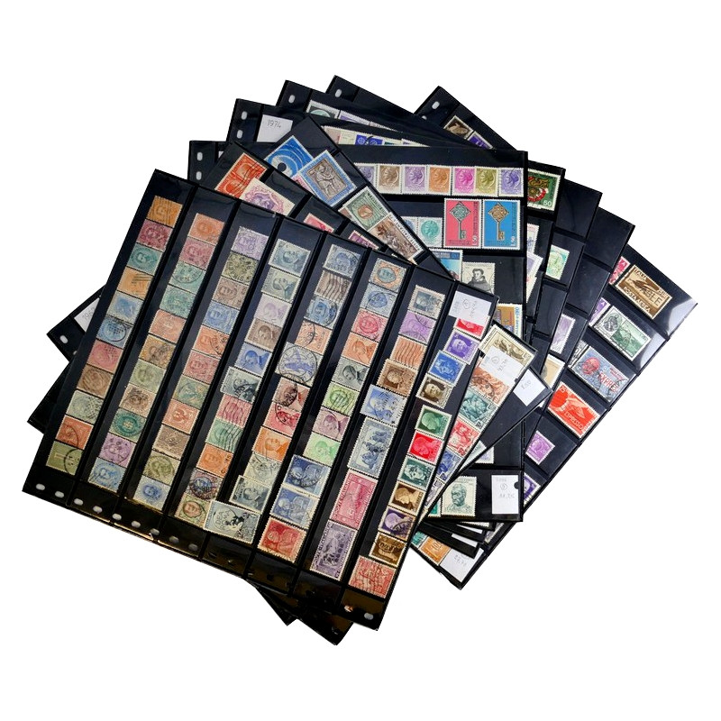 Lot de timbres d'Italie 1863-2002 neufs et oblitérés sur feuilles d'album. Lot de timbres d'Italie 1863-2002 neufs et oblitérés sur feuilles d'album.