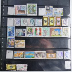 Lot de timbres d'Italie 1863-2002 neufs et oblitérés sur feuilles d'album. Lot de timbres d'Italie 1863-2002 neufs et oblitérés sur feuilles d'album.