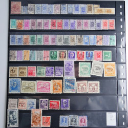 Lot de timbres d'Italie 1863-2002 neufs et oblitérés sur feuilles d'album. Lot de timbres d'Italie 1863-2002 neufs et oblitérés sur feuilles d'album.