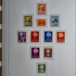 Vrac philatélique de timbres du monde neufs et oblitérés en un carton.