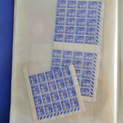 Vrac philatélique de timbres du monde neufs et oblitérés en un carton.