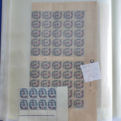 Vrac philatélique de timbres du monde neufs et oblitérés en un carton.