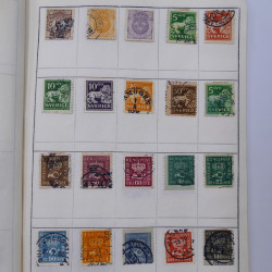 Vrac philatélique de timbres du monde neufs et oblitérés en un carton.