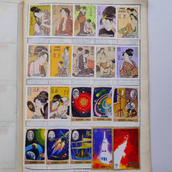 Vrac philatélique de timbres du monde neufs et oblitérés en un carton.