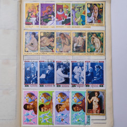 Vrac philatélique de timbres du monde neufs et oblitérés en un carton.