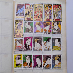 Vrac philatélique de timbres du monde neufs et oblitérés en un carton.