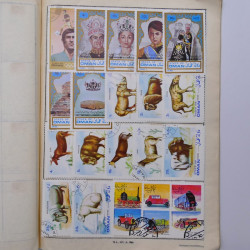 Vrac philatélique de timbres du monde neufs et oblitérés en un carton.