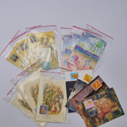 Vrac philatélique de timbres du monde neufs et oblitérés en un carton.