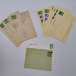 Vrac philatélique de timbres du monde neufs et oblitérés en un carton.