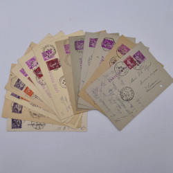 Vrac philatélique de timbres du monde neufs et oblitérés en un carton.