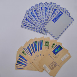 Vrac philatélique de timbres du monde neufs et oblitérés en un carton.