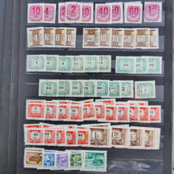 Vrac philatélique de timbres du monde neufs et oblitérés en un carton.