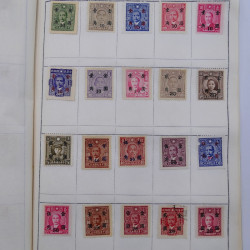 Vrac philatélique de timbres du monde neufs et oblitérés en un carton.