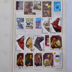 Vrac philatélique de timbres du monde neufs et oblitérés en un carton.