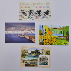 Vrac philatélique de timbres du monde neufs et oblitérés en un carton.