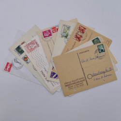 Vrac philatélique de timbres du monde neufs et oblitérés en un carton.