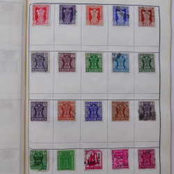 Vrac philatélique de timbres du monde neufs et oblitérés en un carton.