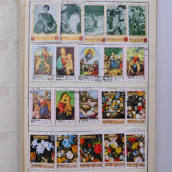 Vrac philatélique de timbres du monde neufs et oblitérés en un carton.