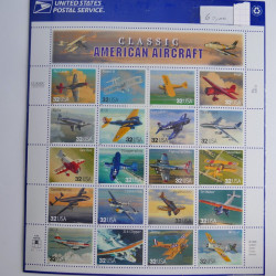 Vrac philatélique de timbres du monde neufs et oblitérés en un carton.