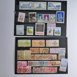 Vrac philatélique de timbres du monde neufs et oblitérés en un carton.