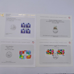Vrac philatélique de timbres du monde neufs et oblitérés en un carton.