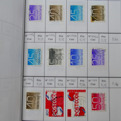 Lot de timbres de Pays-Bas 1852-1997 neufs et oblitérés en 3 carnets à choix.
