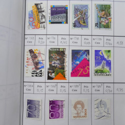 Lot de timbres de Pays-Bas 1852-1997 neufs et oblitérés en 3 carnets à choix.