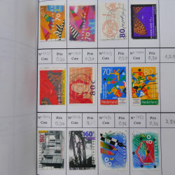 Lot de timbres de Pays-Bas 1852-1997 neufs et oblitérés en 3 carnets à choix.