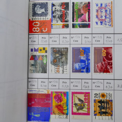 Lot de timbres de Pays-Bas 1852-1997 neufs et oblitérés en 3 carnets à choix.