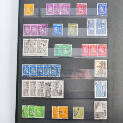 Lot de timbres de Finlande neufs et oblitérés en un album.
