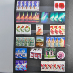 Lot de timbres de Finlande neufs et oblitérés en un album.