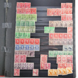 Lot de timbres d'Australie neufs et oblitérés en un album.