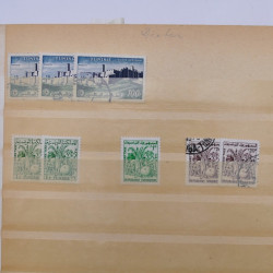 Lot de timbres de Tunisie oblitérés en un album.