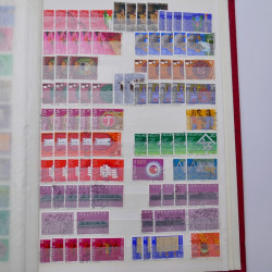 Lot de timbres de Suisse oblitérés en deux albums.